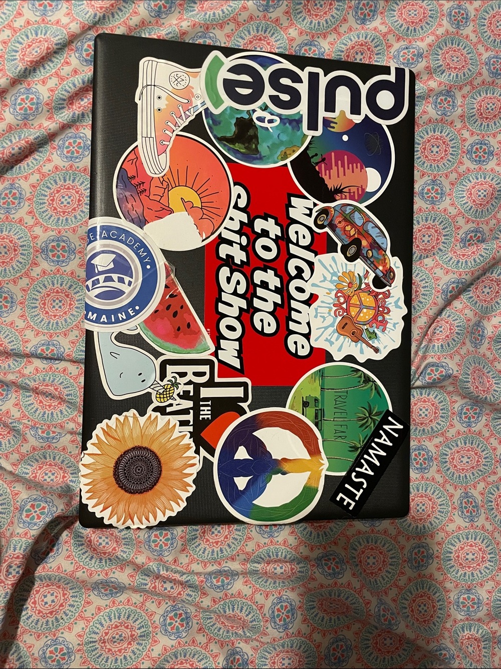 Black Laptop with Colorful Sticker Design - stickers can be removed